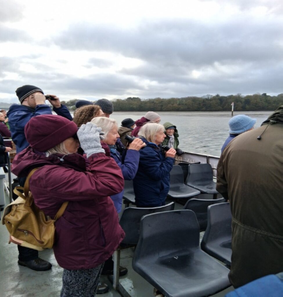 Members on a boat on Plymouth Sound